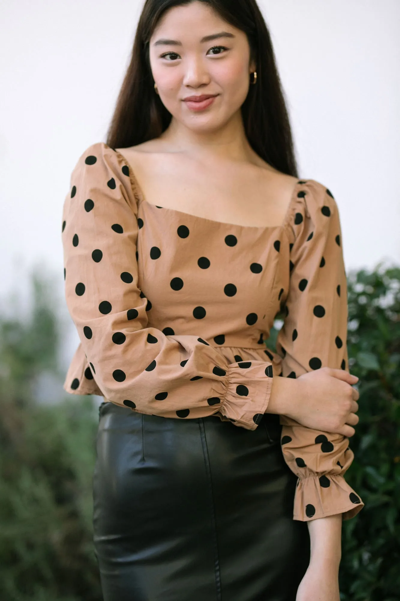 Lourdess Dotted Peplum Top