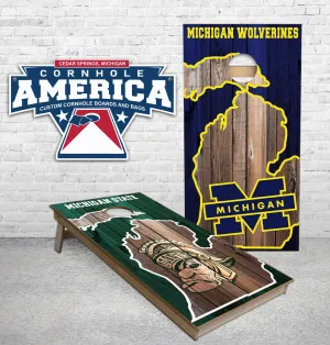 Michigan State Sparty and Michigan Wolverines in MI State Outlined Cornhole Boards